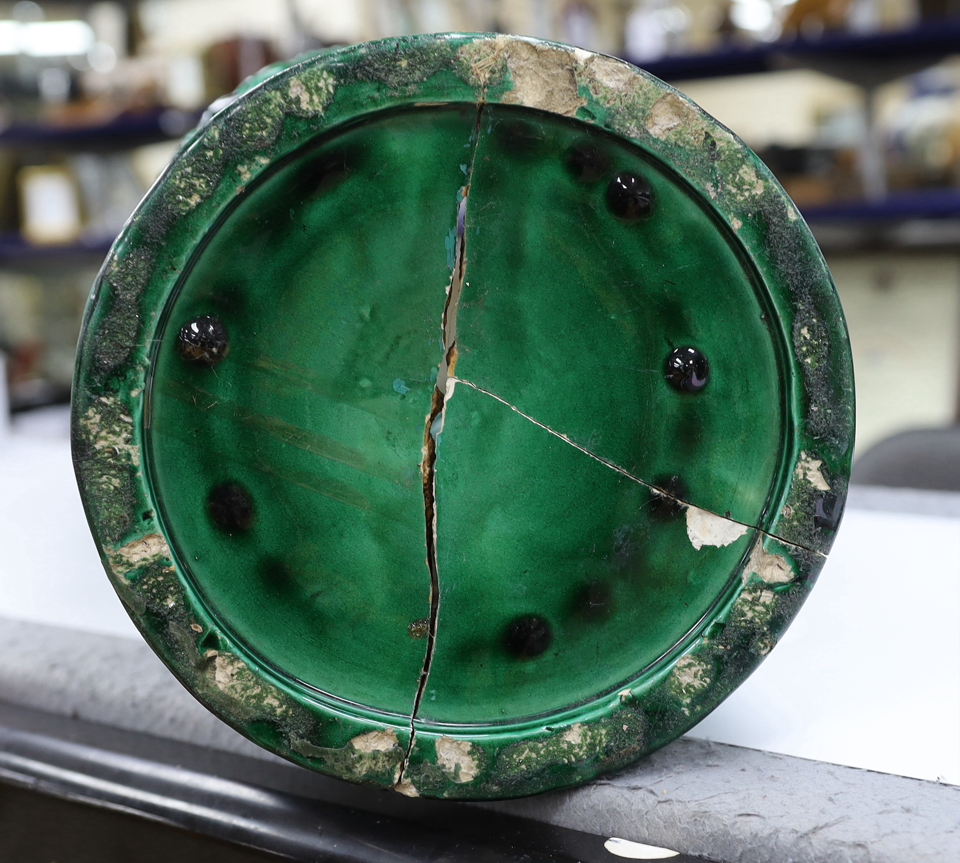 An early 20th century Japanese green glazed ‘dragon’ stick stand, 61cm